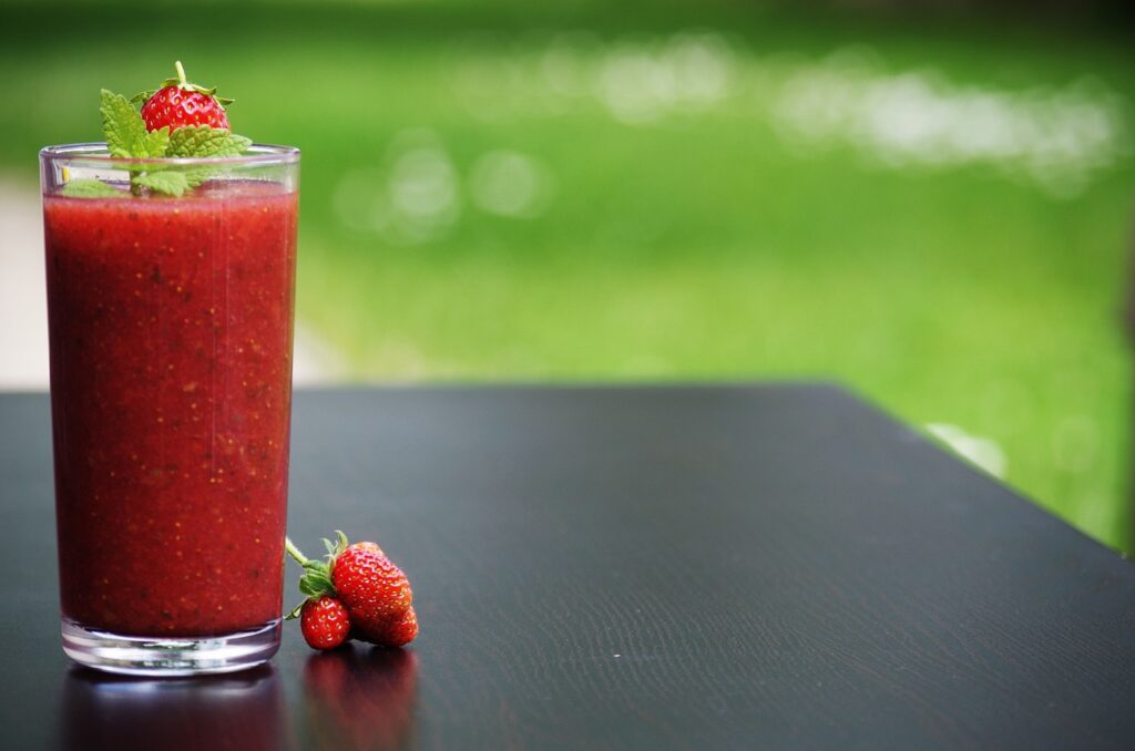 strawberry smoothie in a cup